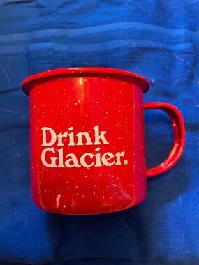 Drink Glacier Distilling Company red speckled enamel camp mug